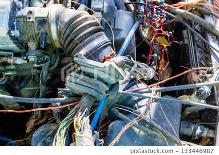 air duct in underhood space in old abandoned car 133446987