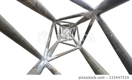 Steel tower interior viewed upward with repeating triangular frame creating geometric perspective and stark industrial mood Steel tower interior viewed upward with repeating triangular frame creating geometric perspective and stark industrial mood 133447319