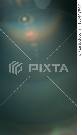 Abstract background of real lens flare for overlay or transition 133448047