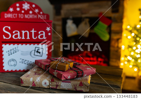 Santa Mailbox with Christmas Gifts and Festive Holiday Decor Indoors Santa Mailbox with Christmas Gifts and Festive Holiday Decor Indoors 133448183
