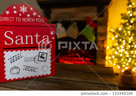 Santa Mailbox with Christmas Gifts and Festive Holiday Decor Indoors Santa Mailbox with Christmas Gifts and Festive Holiday Decor Indoors 133448184