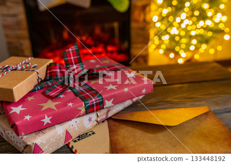 Santa Mailbox with Christmas Gifts and Festive Holiday Decor Indoors 133448192