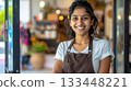 Indian woman barista smiling representing small business ownership. 133448221