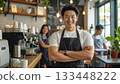 Portrait of confident Asian barista or cafe owner with team. 133448222