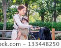 Mother and child going out with a stroller 133448250