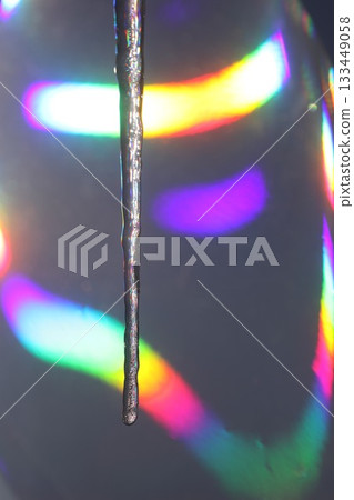 icicles are melting in colorful light 133449058