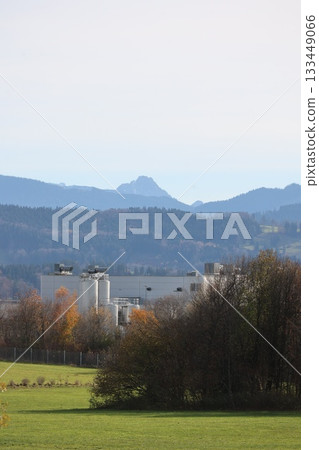 Industrial facility with mountains in the background 133449066