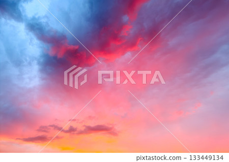 Sky with clouds during sunset after the storm. Nature. Clouds during sunset as a background. Sky with clouds during sunset after the storm. Nature. Clouds during sunset as a background. 133449134