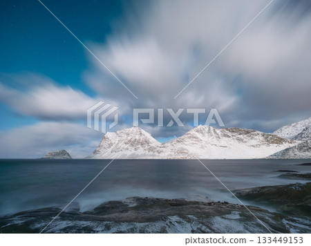 Norway. Night in the fjord. Cloud movement during long exposure.  133449153