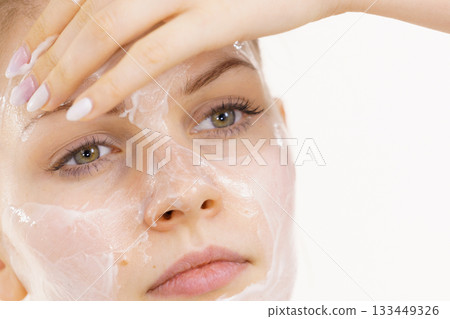 Girl apply cream cosmetic 133449326