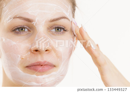 Girl apply cream cosmetic 133449327