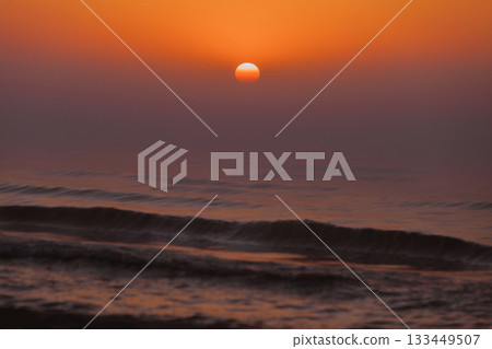 Beatiful red sunset over sea surface 133449507