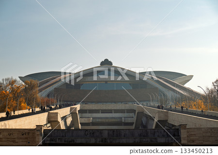 A large building with a lot of windows and a large dome A large building with a lot of windows and a large dome 133450213