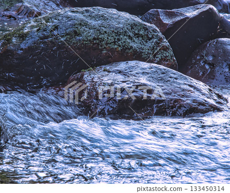 River Flowing Over Rocks 133450314