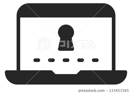 A laptop with a key on it A laptop with a key on it 133451565