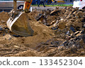 Road work.Excavator bulldozer bucket,road repair 133452304