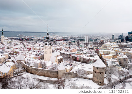 Aerial View of Tallinn in winter, roofs are covered with snow, Christmas mood 133452821