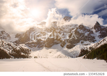Frozen Lake Morskie Oko or Sea Eye Lake in Poland at Winter. 133452828