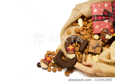 Festive Sinterklaas Display. Sack with treats, gifts, and carrots for Sinterklaas, 133452997