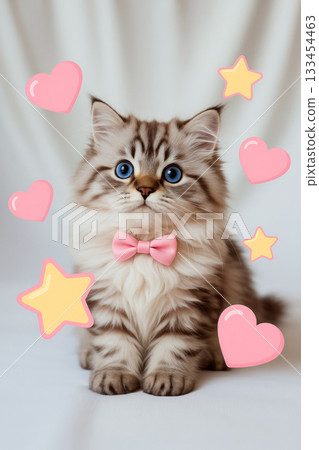A fluffy kitten with blue eyes and a pink bow sits surrounded by cartoon hearts and stars. Concept of cuteness, innocence, and affection. A fluffy kitten with blue eyes and a pink bow sits surrounded by cartoon hearts and stars. Concept of cuteness, innocence, and affection. 133454463