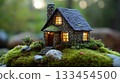 A small, cozy stone house sits atop a mossy hill, warmly lit from within. Concept of fairy-tale or dream-like scenery. For home decoration ideas 133454500