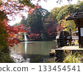 Autumn leaves, waterwheel and fountain 133454541
