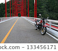 Motorcycle touring with vintage cars 133456171