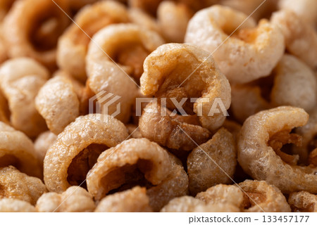 Pork rind texture background, Northern Thai food Pork rind texture background, Northern Thai food 133457177
