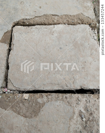stone drainage covers can be found everywhere on sidewalks in rural areas 133457244