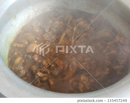 making chicken process in a big pot 133457249
