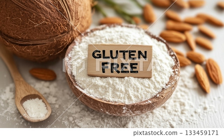 Gluten free text almond flour on wooden bowl healthy ingredient for baking Gluten free text almond flour on wooden bowl healthy ingredient for baking 133459171