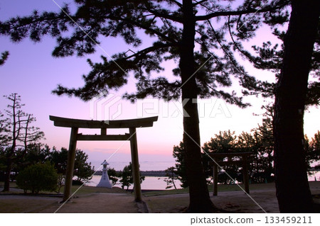 The Harima Sea and the torii gate of Uozumi Sumiyoshi Shrine as the sun sets The Harima Sea and the torii gate of Uozumi Sumiyoshi Shrine as the sun sets 133459211