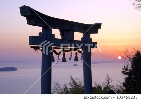 "Torii Gate in the Sky" Takaya Shrine's torii gate and the setting sun over the Seto Inland Sea "Torii Gate in the Sky" Takaya Shrine's torii gate and the setting sun over the Seto Inland Sea 133459235