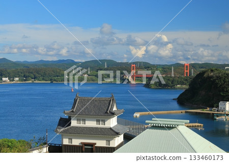View of Hirado Castle's Kaiju Tower and Hirado Bridge under the blue sky 133460173