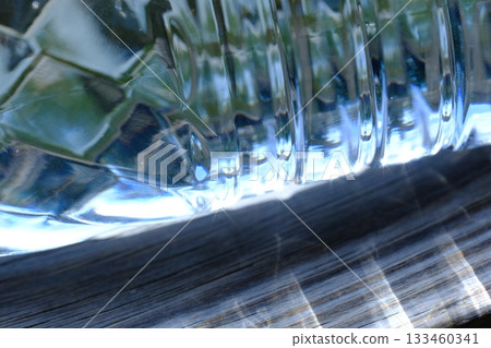 A close-up of a plastic bottle that shines through the light A close-up of a plastic bottle that shines through the light 133460341