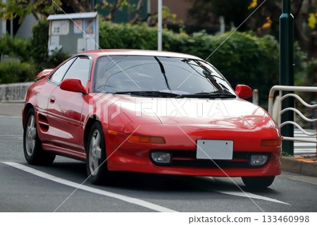 Red domestic sports car Red domestic sports car 133460998
