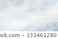 Soft blurry winter background with gentle snowflakes offers subtle texture 133461280