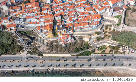 sines portugal. sines skyline view, sines harbor with ancient rooftops, aerial perspective of sines historic neighborhood, panoramic scene of sines historic district sines portugal. sines skyline view, sines harbor with ancient rooftops, aerial perspective of sines historic neighborhood, panoramic scene of sines historic district 133461429