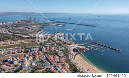 sines portugal. seaside dock overview, large harbor featuring vessels and piers, vast maritime port scene highlighting ships anchored and various harborside architectural sines portugal. seaside dock overview, large harbor featuring vessels and piers, vast maritime port scene highlighting ships anchored and various harborside architectural 133461433