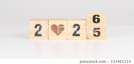 2025 end year to Happy New Year 2026 with heart block for health care, love, organ donation, resolution, charity, happy family, wellbeing and insurance concepts 133461515