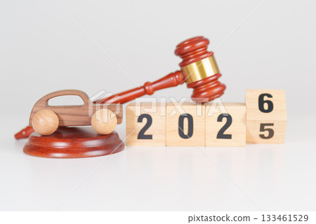 2025 end year to Happy New Year 2026 with small toy car models and Judges gavel on desk in courthouse. Car Law, Insurance, auto Tax, Auction and Bidding concepts 2025 end year to Happy New Year 2026 with small toy car models and Judges gavel on desk in courthouse. Car Law, Insurance, auto Tax, Auction and Bidding concepts 133461529