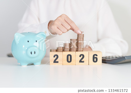 Happy New Year 2026 with piggy bank. Resolution, Goals, Plan, Action, Money Saving, Retirement fund, Pension, Investment and Financial concepts Happy New Year 2026 with piggy bank. Resolution, Goals, Plan, Action, Money Saving, Retirement fund, Pension, Investment and Financial concepts 133461572