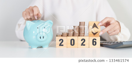 2026 New year with change to UP and Down arrow with coin stack. Interest rate, GDP, stocks market, financial, deflation and Inflation, mortgage, debt, Loan and Economic Recession 2026 New year with change to UP and Down arrow with coin stack. Interest rate, GDP, stocks market, financial, deflation and Inflation, mortgage, debt, Loan and Economic Recession 133461574