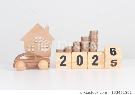 2025 end year to Happy New Year 2026 with car and Home model with coin stack. Car loan, Interest rate, real estate, house, Insurance, Financial, Repair, Tax, mortgage and Maintenance 133461591