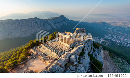 Overlooking the ruins of a Greek temple on the summit 133461921