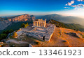 Overlooking the ruins of a Greek temple on the summit 133461923