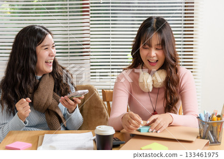 Young business people meet, busy team members consult on financial work in office, smiling women collaborate on project showing successful partnership development. 133461975