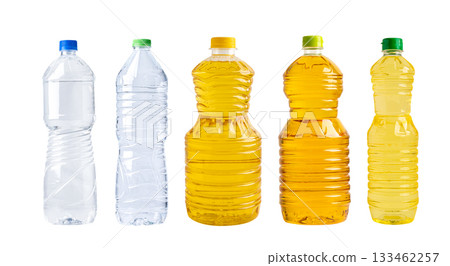 Water and Vegetable oil in different bottle for cooking isolated on white background. Water and Vegetable oil in different bottle for cooking isolated on white background. 133462257