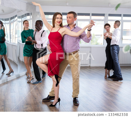 Man and woman dancing waltz in couple during lesson at studio 133462338