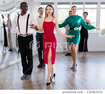Men and women dancers standing in pairs in dance studio 133462433